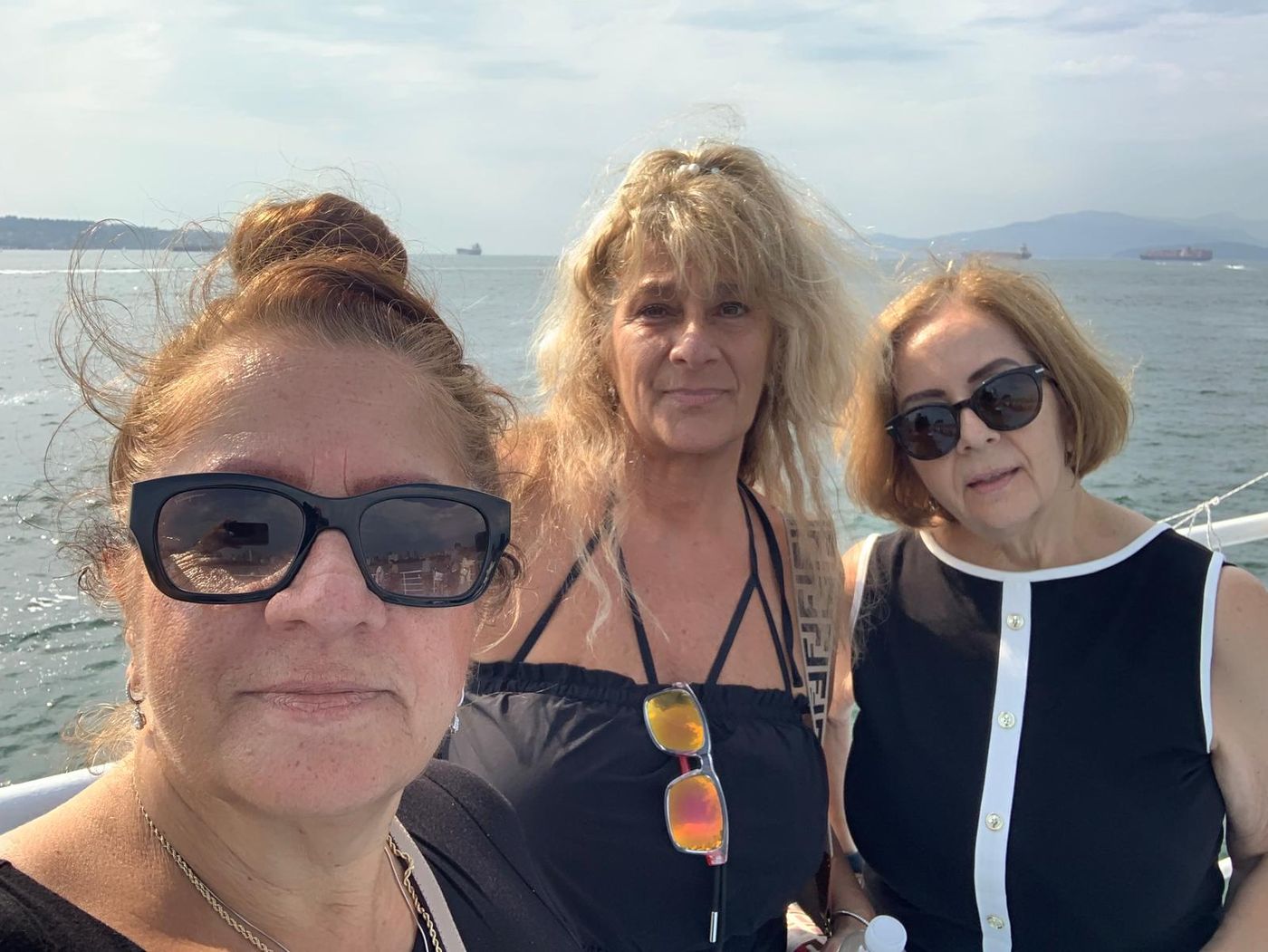 Members together on deck during the brunch cruise