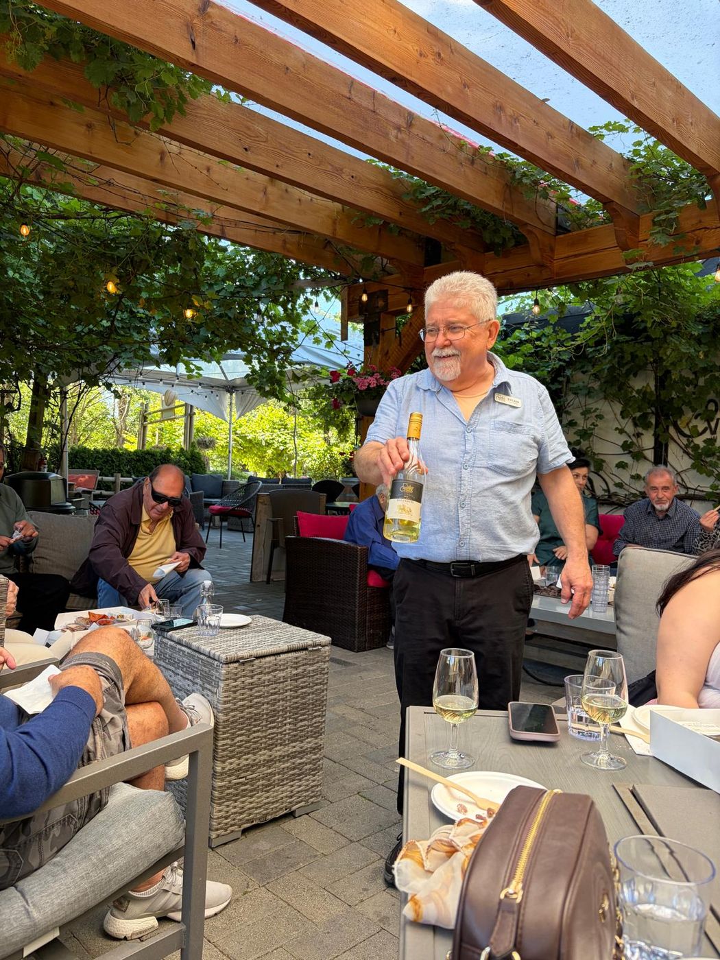 A pour being introduced to guests at the tasting